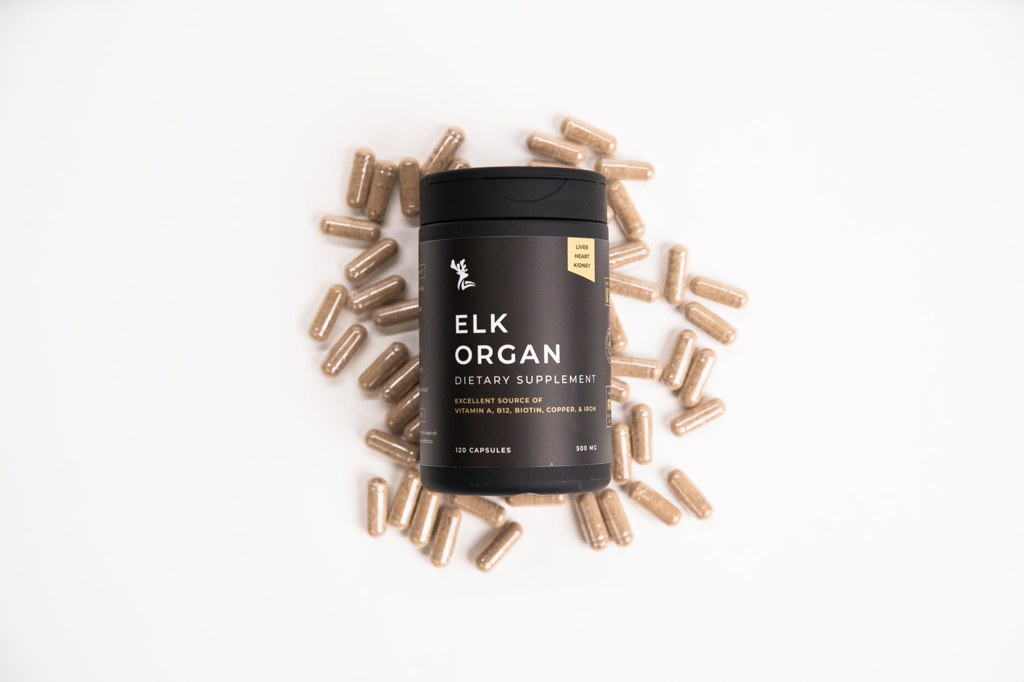 Elk Organ Dietary Supplement black bottle surrounded by capsules