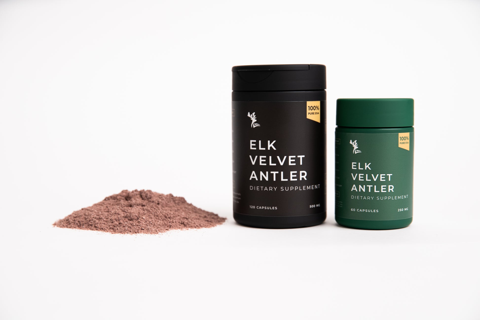Two Elk Velvet Antler Dietary Supplement bottles, one in green and one in black, sitting next to small mound of supplement powder