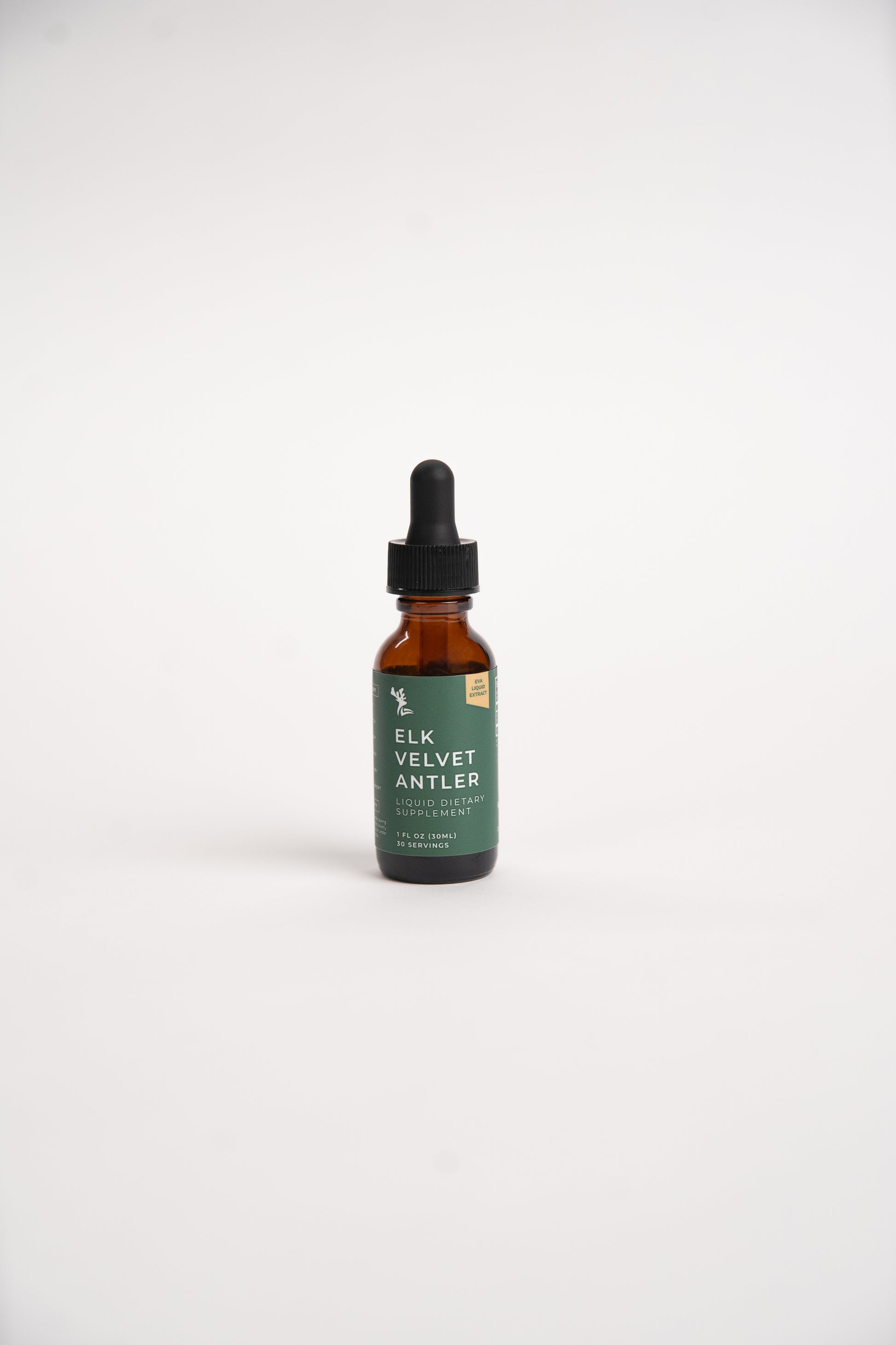 Small amber dropper bottle of Elk Velvet Antler Liquid Dietary supplement on a white background