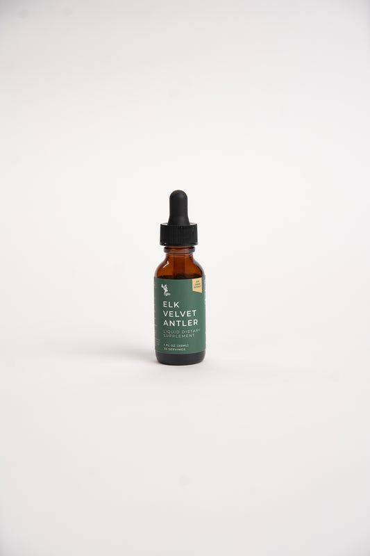 Small amber dropper bottle of Elk Velvet Antler Liquid Dietary supplement on a white background